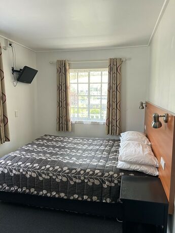 Imagen de la habitación del Hotel Tudor Motor Lodge. Foto 25
