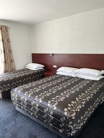 Imagen de la habitación del Hotel Tudor Motor Lodge. Foto 26