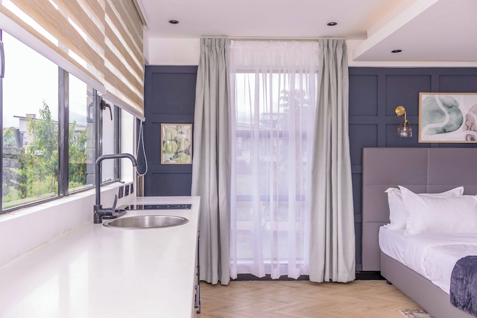 Imagen de la habitación del Hotel Tufaha Resort. Foto 13