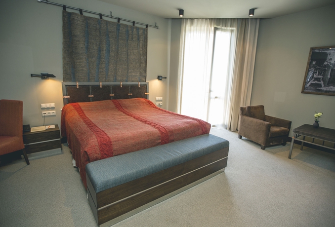 Imagen de la habitación del Hotel Tufenkian Historic Yerevan. Foto 7