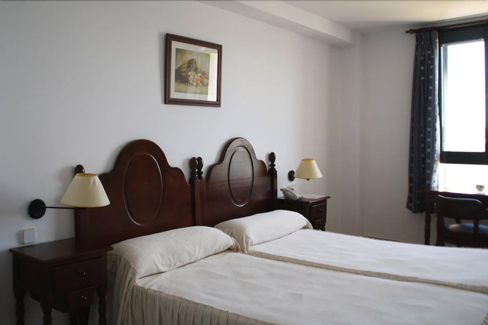 Imagen de la habitación del Hotel Tugasa Arco De La Villa. Foto 7