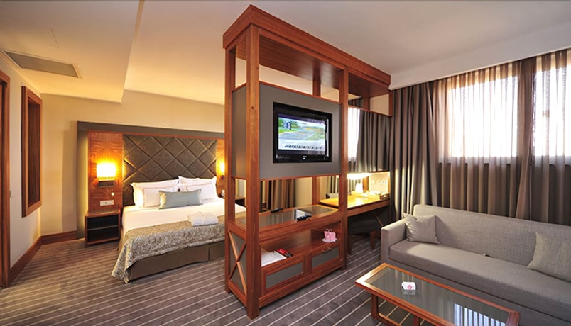 Imagen de la habitación del Hotel Tugcan. Foto 11