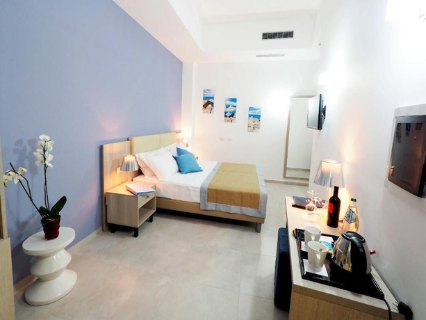 Imagen de la habitación del Hotel Tui Blue Tropea &ndash; Baia di Riaci Resort. Foto 9