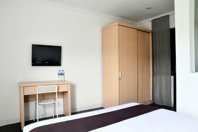 Imagen general del Hotel Tuju Abuserin Syariah. Foto 6