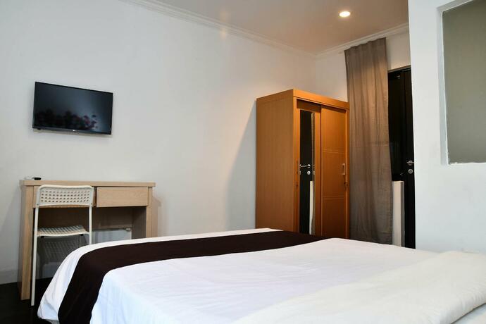 Imagen general del Hotel Tuju Abuserin Syariah. Foto 14