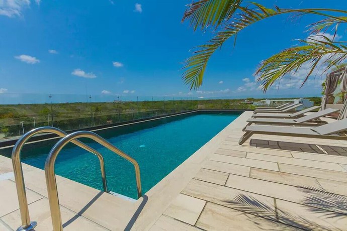 Imagen de la piscina del Hotel Tuk Luxury Apartments By Spot Rentals. Foto 13