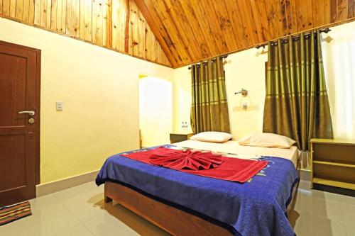 Imagen de la habitación del Hotel Tuk Tuk Timbul Bungalows. Foto 2