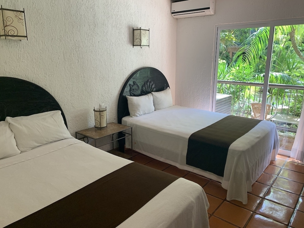 Imagen de la habitación del Hotel Tukan Hotel Playa del Carmen. Foto 3