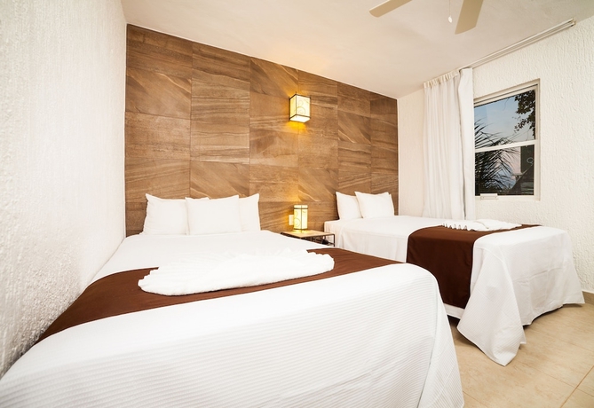 Imagen de la habitación del Hotel Tukan Hotel Playa del Carmen. Foto 13