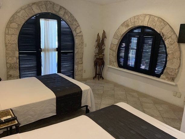 Imagen de la habitación del Hotel Tukan Hotel Playa del Carmen. Foto 16