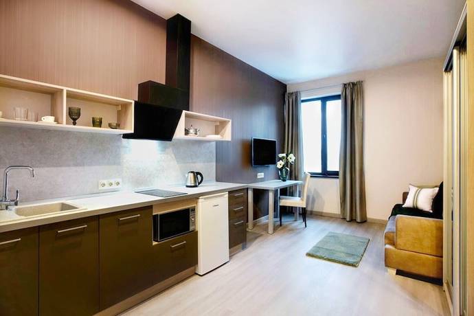 Imagen de la habitación del Hotel Tulip Apartments. Foto 7