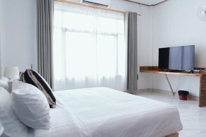 Imagen de la habitación del Hotel Tulip. Foto 13