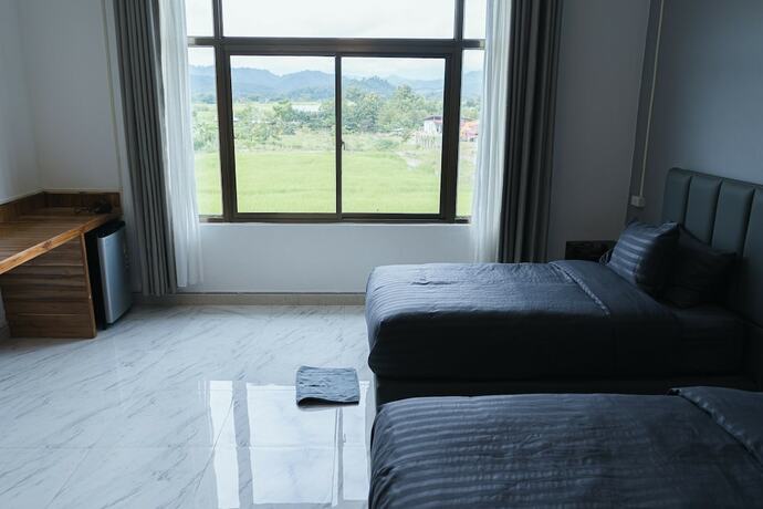 Imagen de la habitación del Hotel Tulip. Foto 14