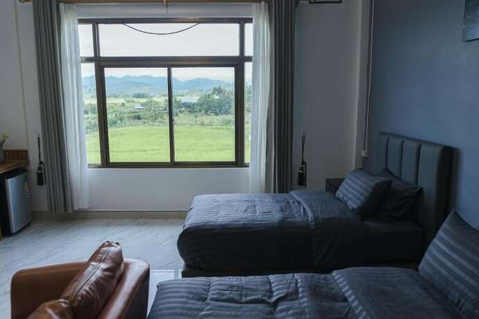 Imagen de la habitación del Hotel Tulip. Foto 18