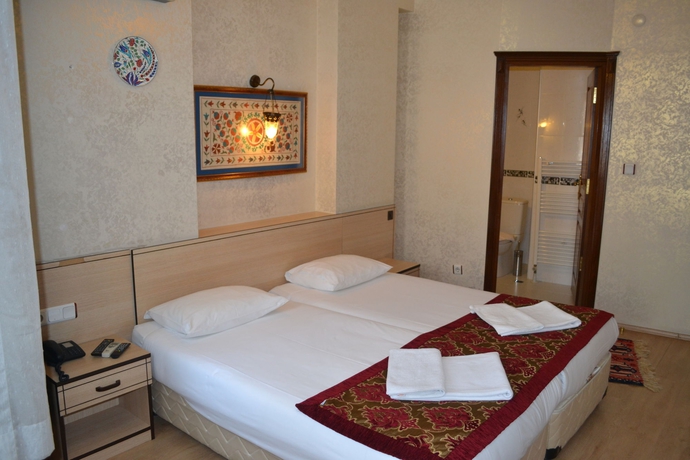 Imagen de la habitación del Hotel Tulip House. Foto 2