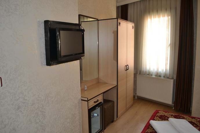 Imagen de la habitación del Hotel Tulip House. Foto 4