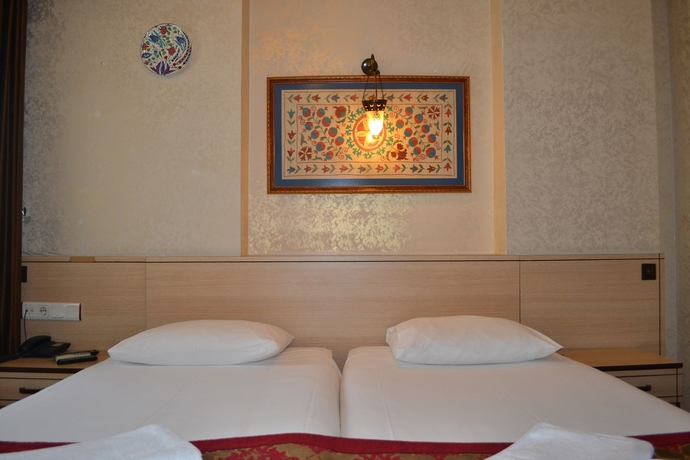 Imagen de la habitación del Hotel Tulip House. Foto 9