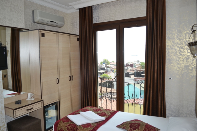 Imagen de la habitación del Hotel Tulip House. Foto 10