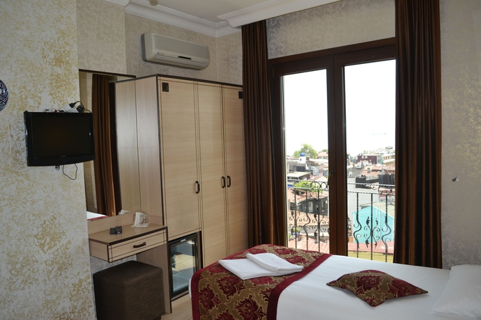 Imagen de la habitación del Hotel Tulip House. Foto 11