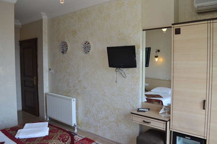 Imagen de la habitación del Hotel Tulip House. Foto 12