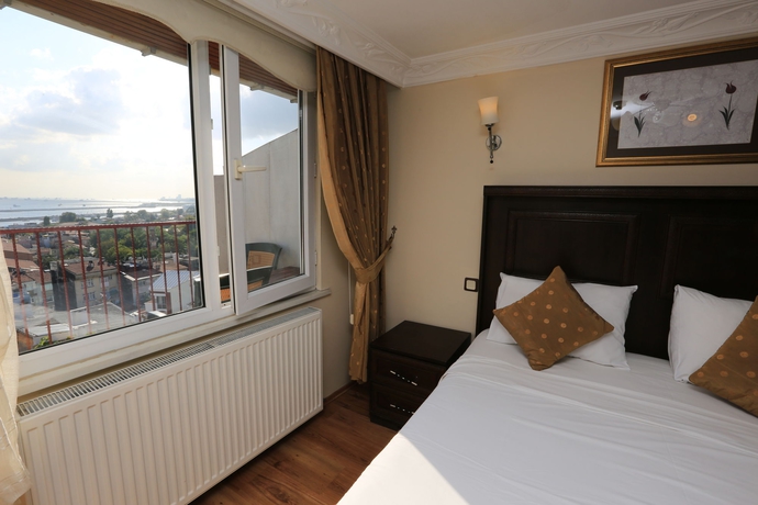 Imagen de la habitación del Hotel Tulip House. Foto 13