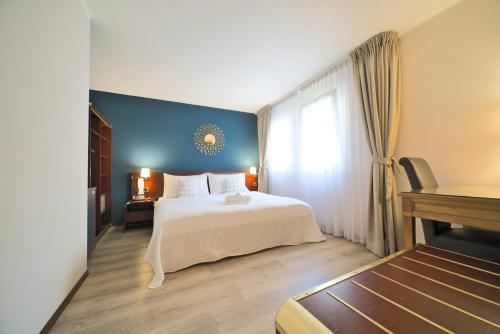 Imagen de la habitación del Hotel Tulip Inn Lausanne Beaulieu. Foto 9