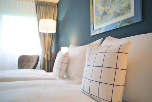 Imagen de la habitación del Hotel Tulip Inn Lausanne Beaulieu. Foto 11