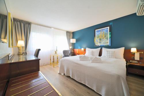 Imagen de la habitación del Hotel Tulip Inn Lausanne Beaulieu. Foto 14