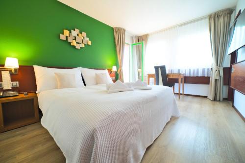 Imagen de la habitación del Hotel Tulip Inn Lausanne Beaulieu. Foto 18