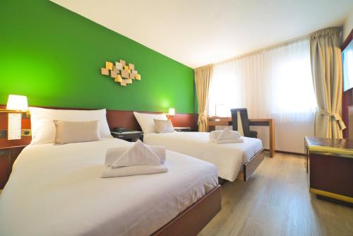 Imagen de la habitación del Hotel Tulip Inn Lausanne Beaulieu. Foto 19