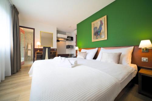 Imagen de la habitación del Hotel Tulip Inn Lausanne Beaulieu. Foto 20