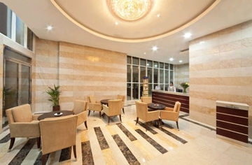 Imagen del bar/restaurante del Hotel Tulip Inn Royal Suites. Foto 3