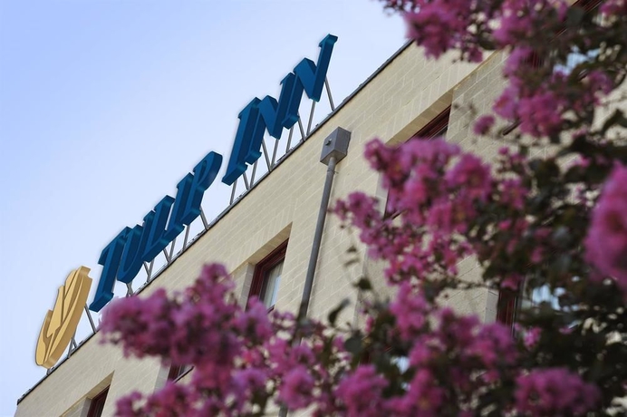 Imagen de los exteriores del Hotel Tulip Inn Turin South. Foto 15