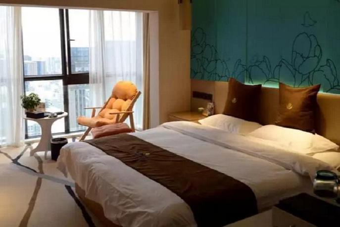 Imagen de la habitación del Hotel Tulip Inn Xi Yue - Kunming. Foto 6