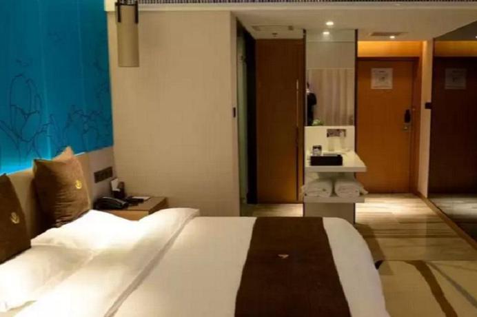 Imagen de la habitación del Hotel Tulip Inn Xi Yue - Kunming. Foto 11