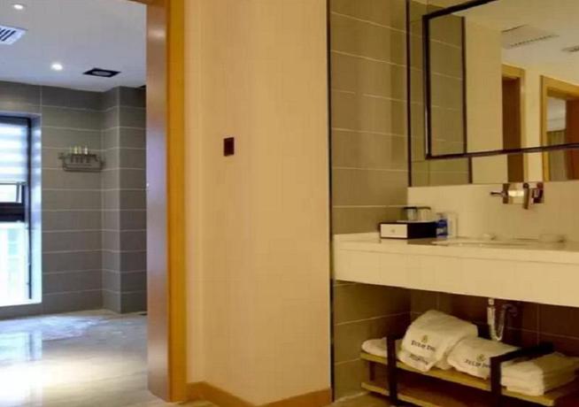 Imagen de la habitación del Hotel Tulip Inn Xi Yue - Kunming. Foto 16