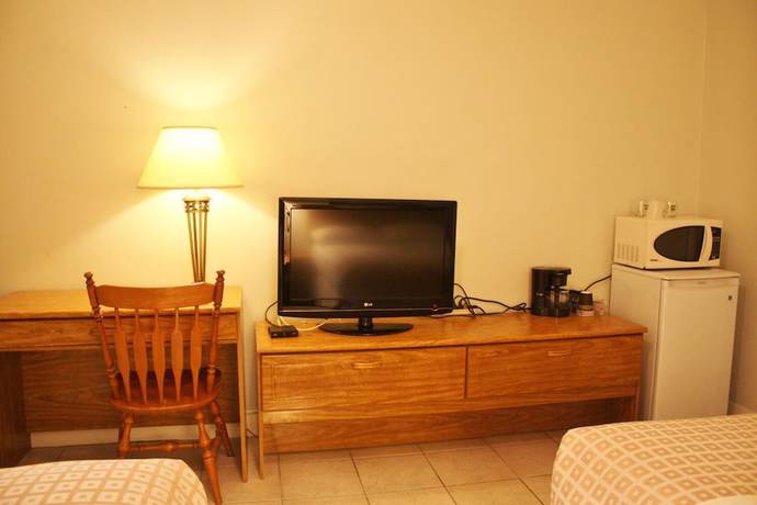 Imagen de la habitación del Hotel Tulip Motel. Foto 11