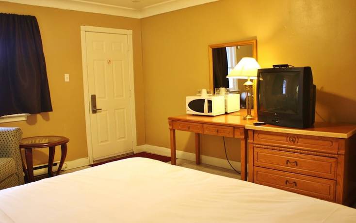 Imagen de la habitación del Hotel Tulip Motel. Foto 12