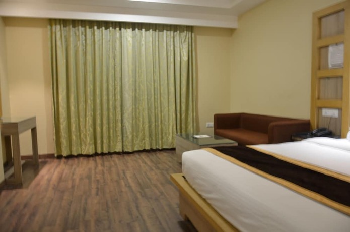 Imagen de la habitación del Hotel Tulip Tree. Foto 12