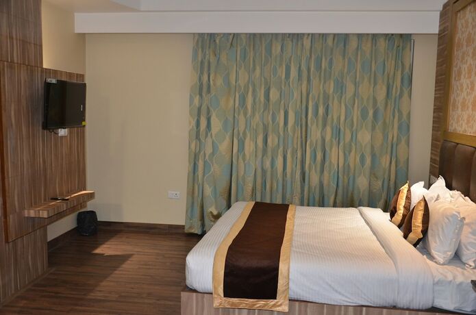 Imagen de la habitación del Hotel Tulip Tree. Foto 15
