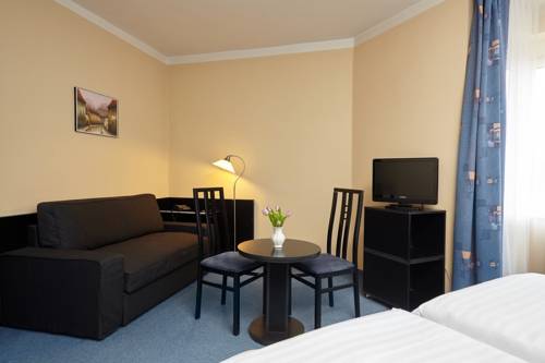 Imagen de la habitación del Hotel Tulipan Pruhonice. Foto 3