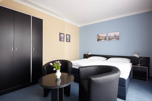 Imagen de la habitación del Hotel Tulipan Pruhonice. Foto 4