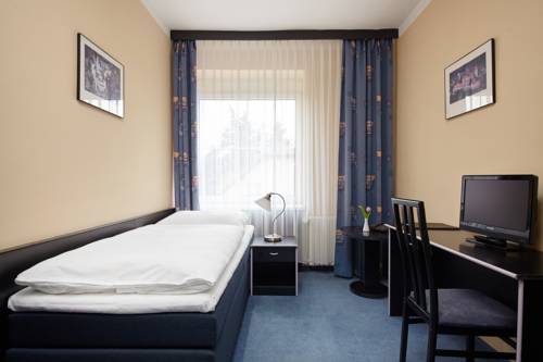 Imagen de la habitación del Hotel Tulipan Pruhonice. Foto 8