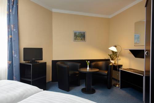 Imagen de la habitación del Hotel Tulipan Pruhonice. Foto 12