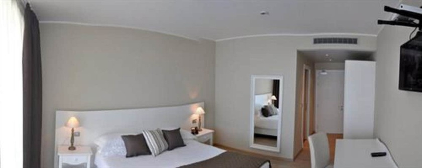 Imagen de la habitación del Hotel Tullio. Foto 12