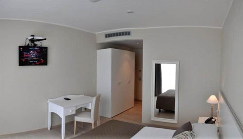 Imagen de la habitación del Hotel Tullio. Foto 13