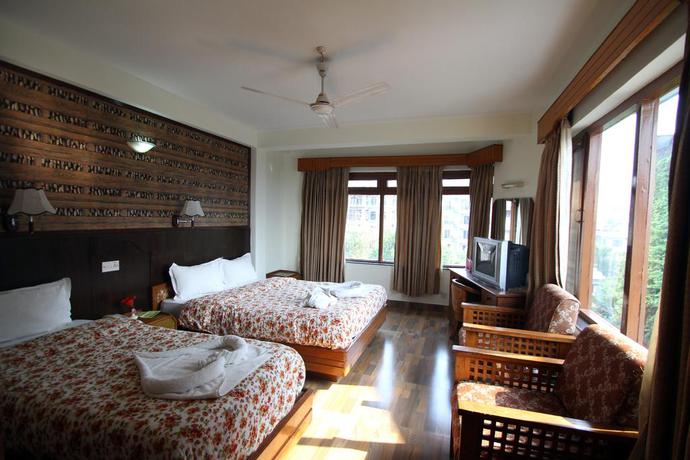 Imagen de la habitación del Hotel Tulsi. Foto 5