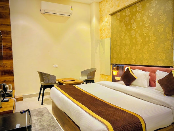 Imagen de la habitación del Hotel Tulsi Grand Inn. Foto 2