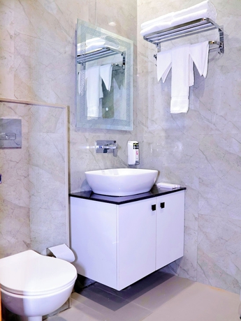 Imagen de la habitación del Hotel Tulsi Grand Inn. Foto 5