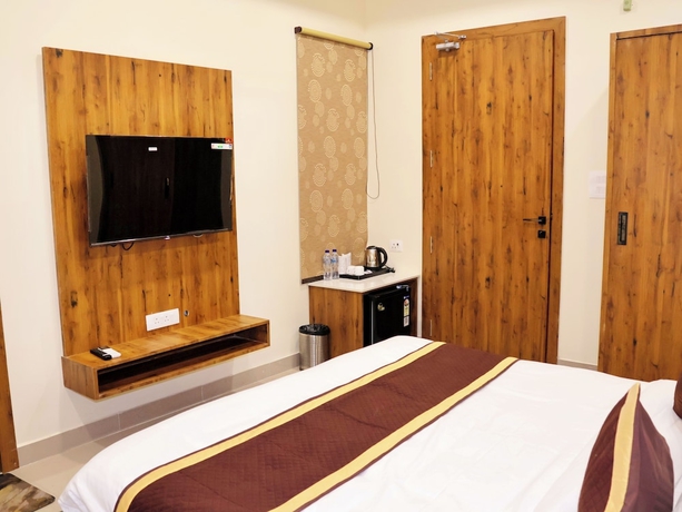 Imagen de la habitación del Hotel Tulsi Grand Inn. Foto 6
